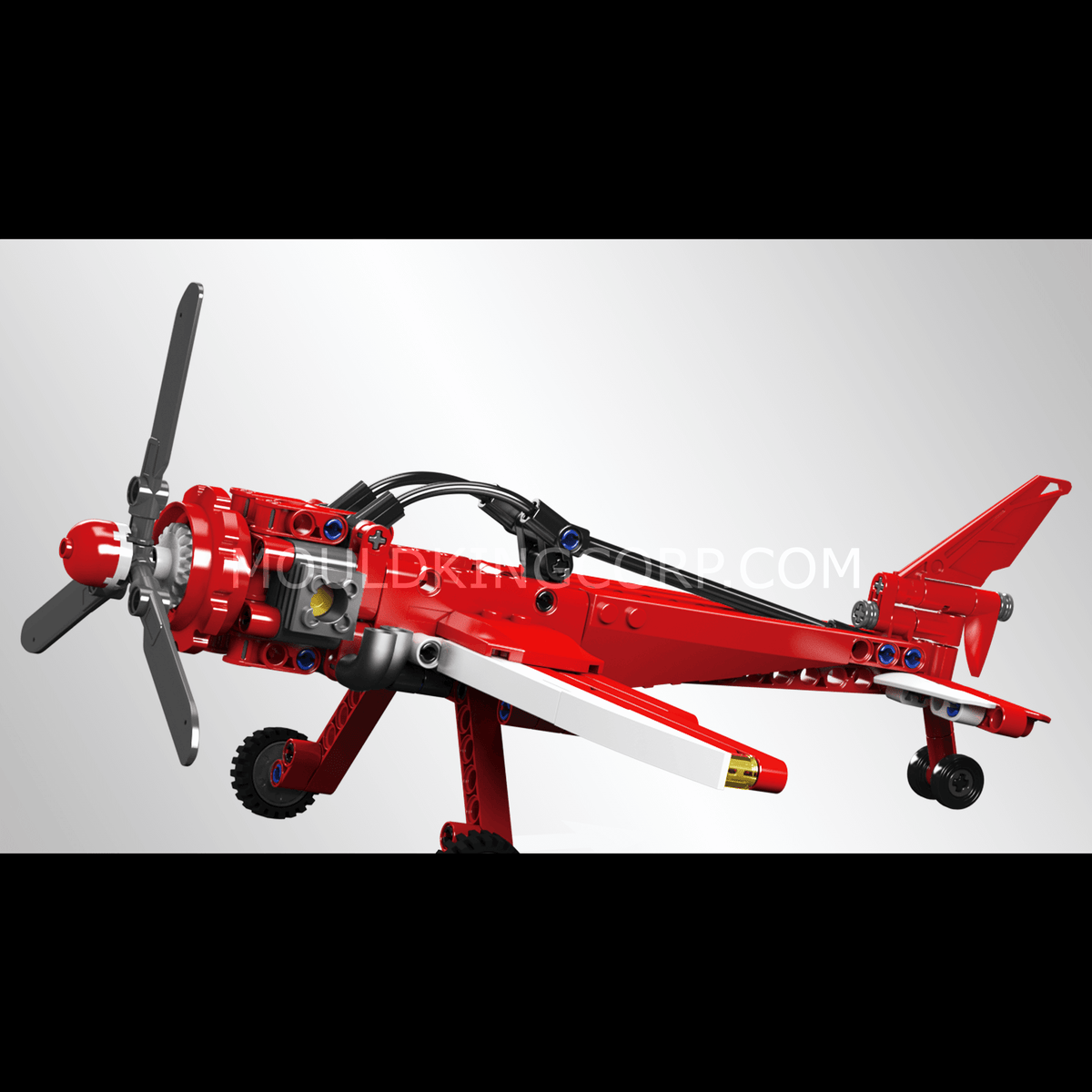 Avion de course rouge à hélice, vue 3