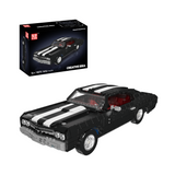 Coupé américain noir de la fin des années 60, vue principale