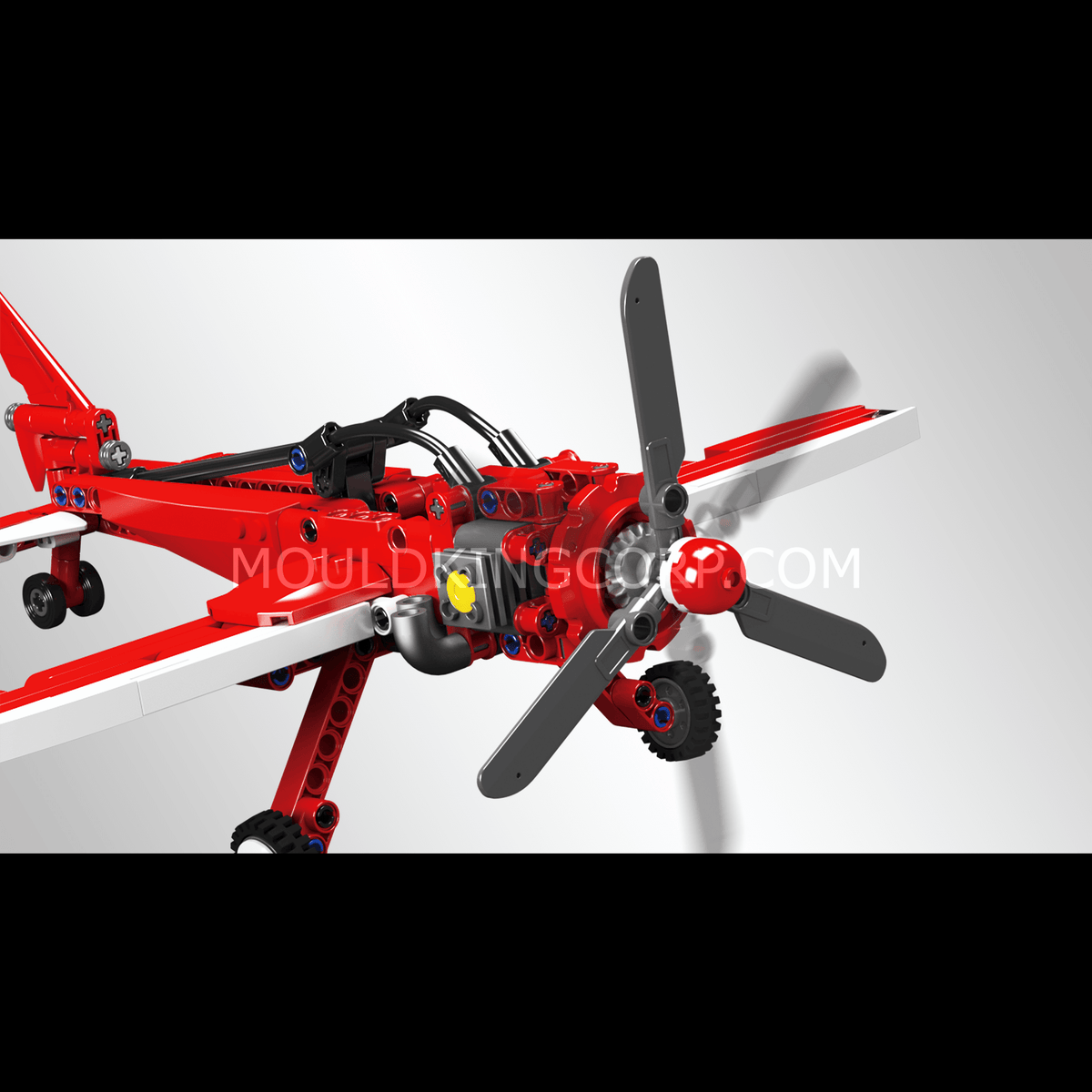 Avion de course rouge à hélice, vue 4