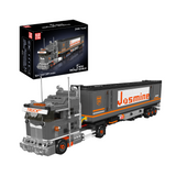 Camion à cabine avancée et remorque conteneur, vue principale