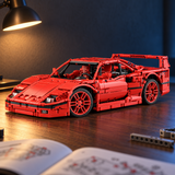 Ambiance – Voiture de course légendaire télécommandée 1:10, V8 biturbo sur l'établi, notice et pièces