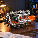 Ambiance – Moteur de camion six cylindres et transmission, maquette sur l'établi, notice et pièces